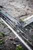 Telephone pole damaged by bad weather.