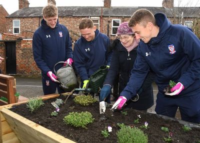 (L-R) Alex Kempster, Kallum Griffiths, Kay Watkins (The Lanes Community Garden) and David Ferguson lending a helping hand..jpg