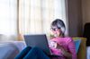 Lady looking at laptop