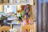 Lady_on_phone_kitchen.png