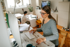 lady-on-mac-with-child.png
