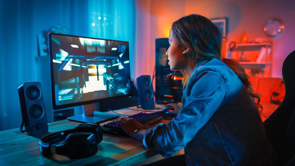 Female at gaming pc