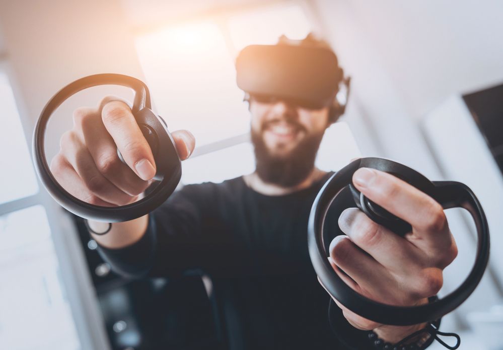 Man with VR Headset and controllers