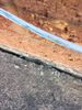 Split in insulation with wires exposed.