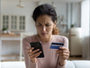 Lady-with-mobile-and-card