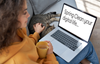 Female-with-laptop-&-cat